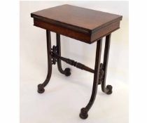 Georgian mahogany small proportion fold-over card table supported by open ends and a turned