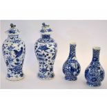 Group: pair of 19th century Chinese blue and white baluster lidded vases, decorated with birds