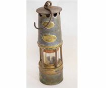 Vintage brass and base metal miner's lamp stamped 17, 28cms tall