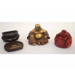 Chinese cinnamon lacquered Buddha on carved treen base, together with a further gilded example