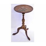 Early 20th century mahogany and chinoiserie decorated wine table with circular top on a turned and