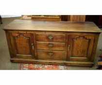 Late 18th/early 19th century oak dresser base fitted centrally with three drawers flanked either