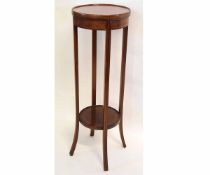 Edwardian mahogany and satinwood inlaid circular two-tier plant stand supported on four square legs,