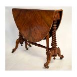 Victorian walnut circular Sutherland table with twisted column ends and scrolling supports raised on