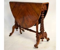 Victorian walnut circular Sutherland table with twisted column ends and scrolling supports raised on