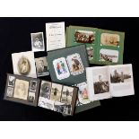 Collection postcards in two old albums including Norfolk topographical, Norfolk real photographic