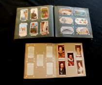 Old cigarette card album, and one smaller album, mainly part sets including Carreras 1924:
