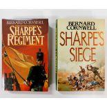 BERNARD CORNWELL: 2 titles: SHARPE'S REGIMENT, London, Collins, 1986, 1st edition, signed,