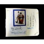 Stan Laurel (1890-1965) and Oliver Hardy (1892-1957), autographs on piece with small coloured
