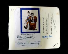 Stan Laurel (1890-1965) and Oliver Hardy (1892-1957), autographs on piece with small coloured