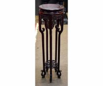 Mid-20th century Oriental hardwood circular plant stand with pierced fretwork sides with an open