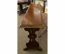 19th century mahogany narrow rectangular table with decorative pierced and shaped ends, with