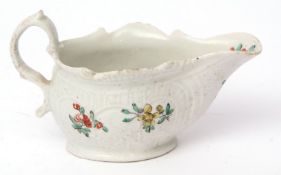 Liverpool (Philip Christian) sauceboat, circa 1770, the moulded body with strap handle, decorated
