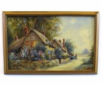 Joseph Hughes Clayton, signed watercolour, Figures before thatched cottages, 28 x 45cms
