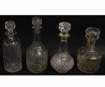 Collection of four various lead crystal and other glass decanters (conditions vary), largest 28cms