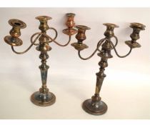 Pair of copper patinated candelabra, 44cms high