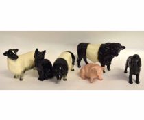 Collection of farm animals including dog and a cat by Beswick and other models of pigs (6)