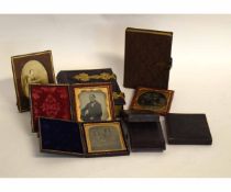 Six assorted leather cased Ambrotypes with family portraits, together with two brass mounted photo