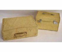 Cream rexine Finnigans of London small vanity case together with a further cream rexine Drew &