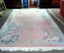 Chinese wool wash thick pile carpet with pink ground with floral decoration, 245cms wide x 350cms