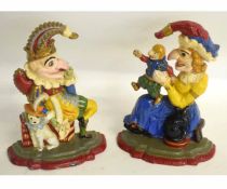 Good quality painted pair of cast iron doorstops modelled as Punch & Judy, each 30cms tall