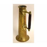 Arts & Crafts brass jug with decorative oak handle, 30cms tall