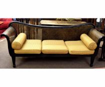 Good quality Bergere three-seater sofa with scroll arms and shaped back with gold upholstered