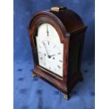 JAMES ROGERS, LONDON C19th mahogany domed topped mantle clock, the arched dial with twin winding