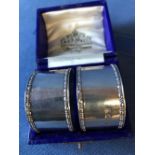 Pair of hallmarked silver napkin rings by Thomas Bradbury & Son, Sheffield 1918, cased, 2 ozt