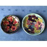 Moorcroft pomegranate circular dish, impressed & signed, 23cm dia & another Moorcroft plate