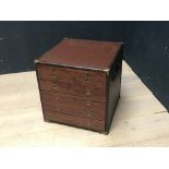 Leather and brass bound contemporary Campaign trunk of 5 drawers beneath a slide, 50cm sq.