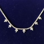 18 carat white gold diamond necklace of 3.7 carats with 7 snow flake style drops