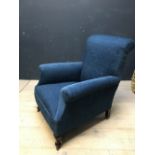 Contemporary armchair recently upholstered in blue fabric