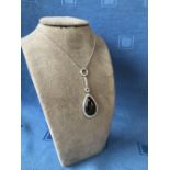 18 carat white gold impressive pear shaped black opal and diamond pendant necklace