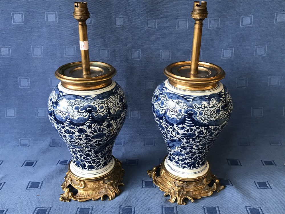 Pair of blue and white Delft vase shaped ormolu table lamps, 30cmH