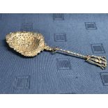 Large hallmarked silver decorative embossed strainer spoon, Birmingham 1894, 2.64 ozt