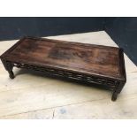 Chinese hardwood oblong low table with carved frieze, 105Lx42Wx29Hcm