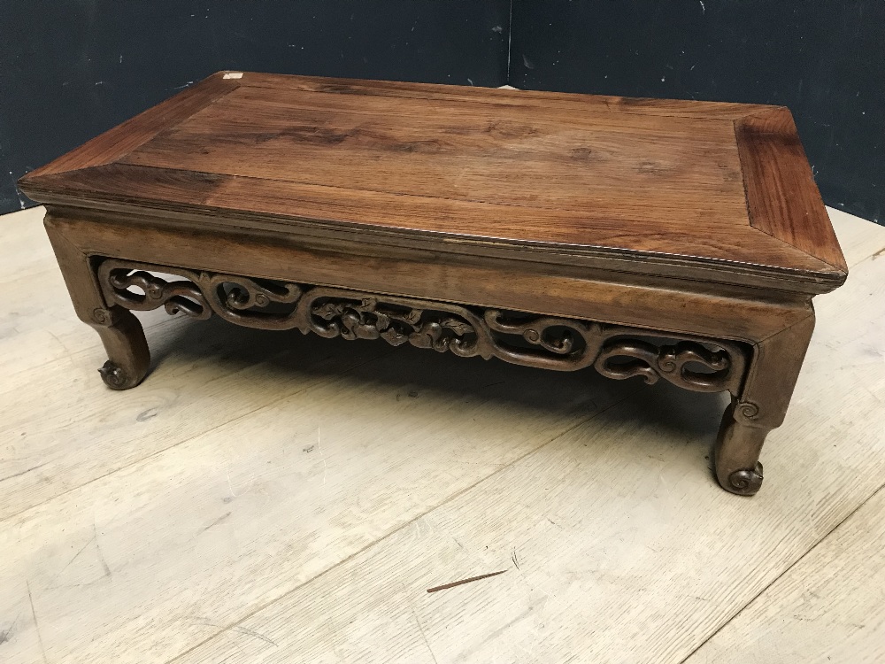 Chinese hardwood rectangular low table with a scrolling carved frieze, 77Lx41Wx27Hcm