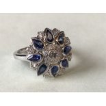 18 carat white gold, sapphire and diamond cluster ring of 2.3 carats