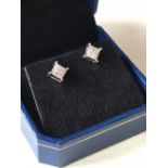 Pair of 14 carat white gold diamond stud earrings of 1 carat