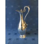Early Victorian hallmarked silver wine jug with engraved decoration of vines by Joseph & Joseph