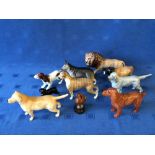 7 Beswick dogs, a lion, Jersey bull and Bell's whisky (10)