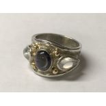 Sterling silver & 18ct yellow gold tapered bombe ring set with cabochon Moonstone & Iolite, size N