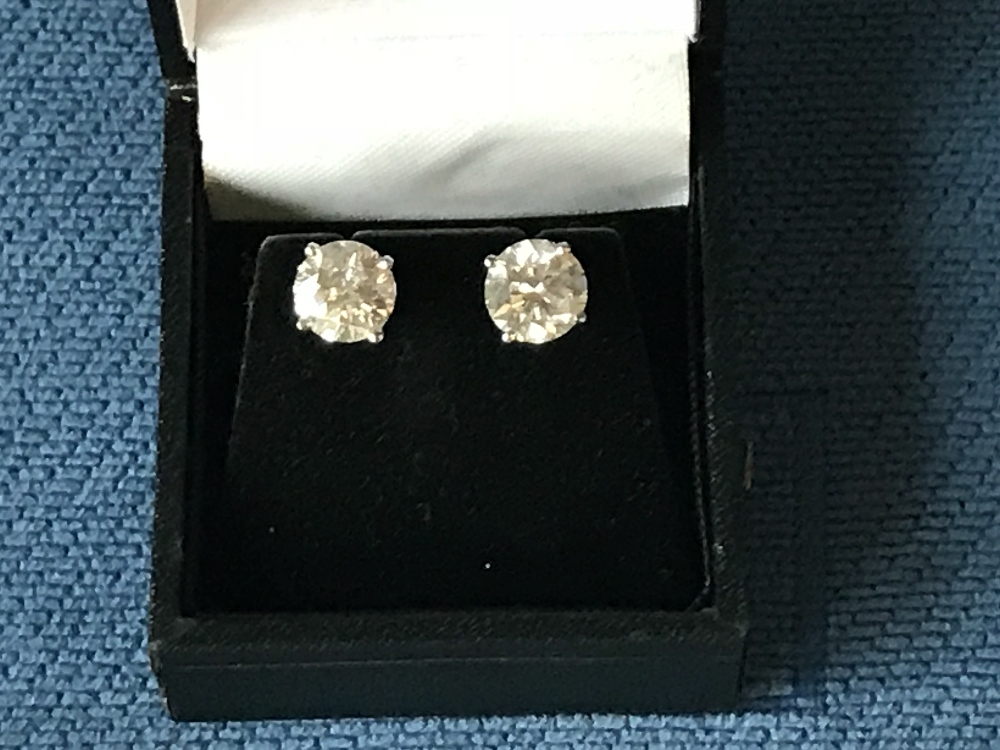 Pair of 18 carat white gold diamond stud earrings of 4.2 carats, colour H/J clarity Si - Image 2 of 2