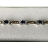 14 carat yellow gold, sapphire and diamond bracelet