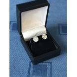 Pair of 18 carat white gold diamond stud earrings of 4.2 carats, colour H/J clarity Si