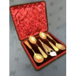 Cased set of good quality silver plated open work grape scissors & 4 table spoons with waterfowl