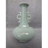 Chinese Celadon twin handle vase with character mark to base, 16cmH