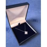 14 carat white gold, sapphire and diamond pendant necklace