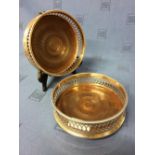 Pair of hallmarked silver bottle coasters with galleried rims, London 1971